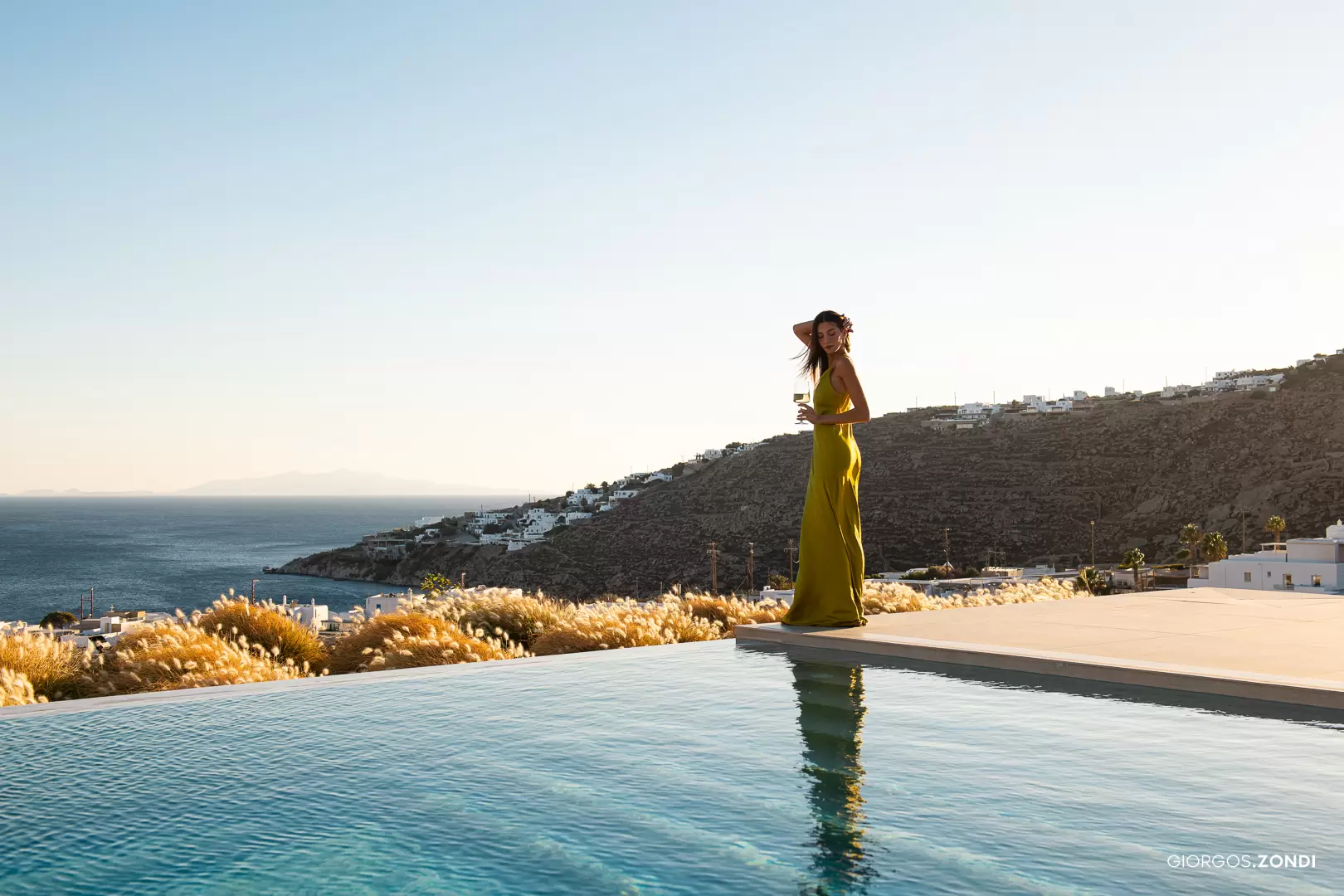 infinity pool photography in mykonos greece